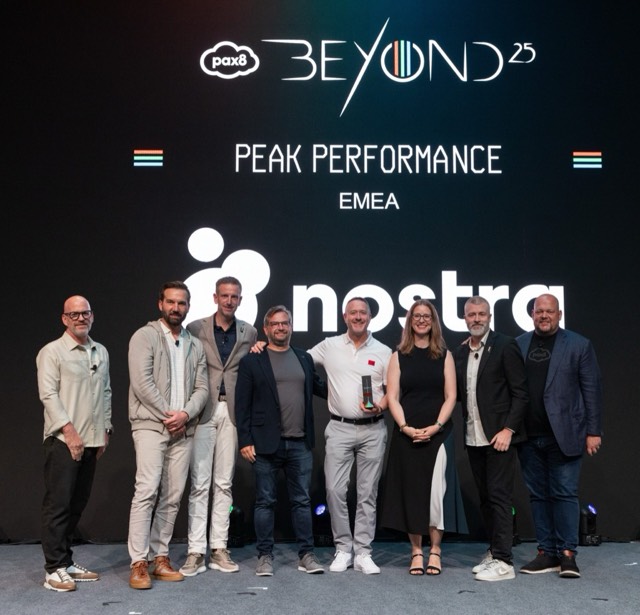 Nostra team accepting the Pax8 Beyond Peak Performance EMEA award
